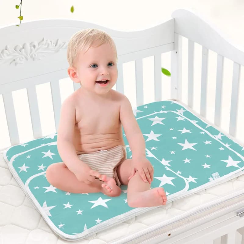 Tapis à Langer Étoiles – Le Réutilisable